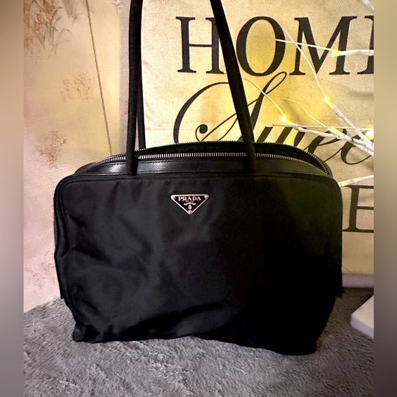Prada black nylon tote. Great on outside. Needs repair on insider. See all pics - Picture 1 of 11